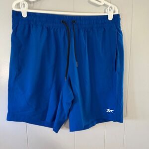 NWT Reebok WOR Woven Shorts Mens Large Blue Athletic Training 9 Inch Inseam